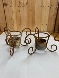 PAIR OF CAST IRON PLANTERS