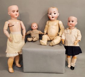 LOT OF 4 GERMAN BISQUE DOLLS