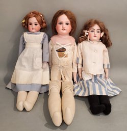 LOT OF 3 GERMAN BISQUE DOLLS W/ LEATHER BODIES