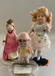 3  Small Dolls