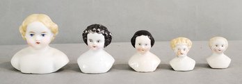 LOT OF SMALL ANTIQUE DOLL HEADS