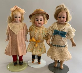 3  Small Dolls