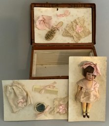 7 Paper Covered Lift Top Doll Trunk With 5 Bisque Doll